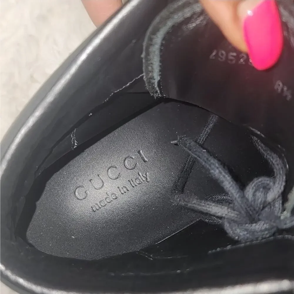 gucci black leather Laceup sneakers, with GG logo and cherry line on the side.